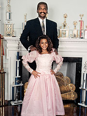 Beyonce with father and trophies
