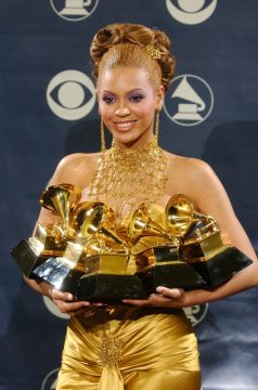 Beyonce with Grammy Awards